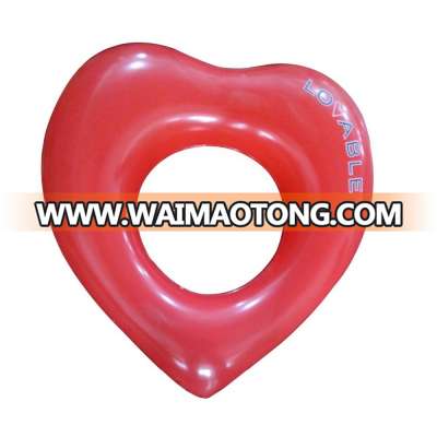 Logo print cheap pvc inflatable heart swimming ring